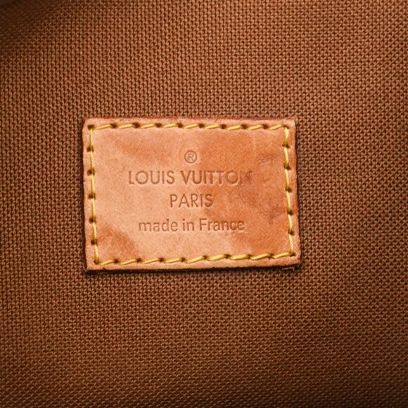 LOUIS VUITTON Brown Monogram Leather Backpack - Picture 14 of 16